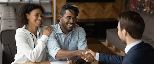 Grateful,Black,Family,Couple,Handshake,With,Bank,Manager,Insurer,Lawyer