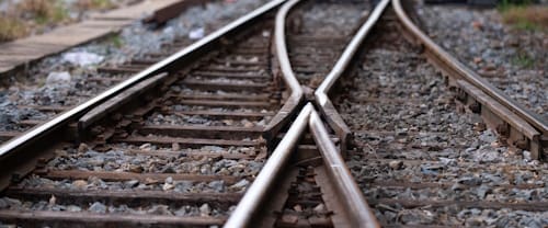 Railroad,Tracks,With,A,Junction,On,The,Front