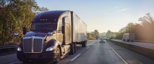Truck,On,Road,At,Sunrise
